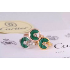 Inel Amulette de Cartier cu malachit și diamant în aur galben, aur alb și aur roz